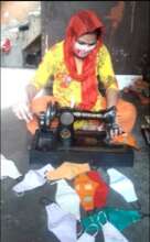 Beneficiaries making Handmade masks for deprived c