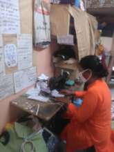 Handmade mask making by a Center in-charge
