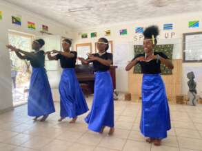 Student display Rwandan dances at USAPCS