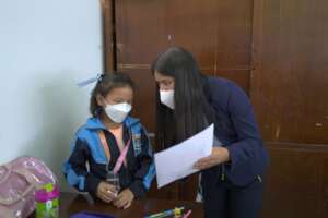 Kristtel and one of her students