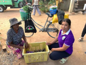 Giving out food supplies in the community