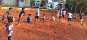 Children playing in the sports ground