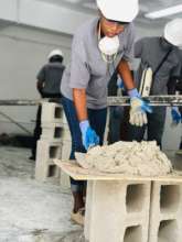 One of our female students in a Masonry class