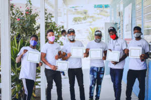 Welding graduates with their certificate