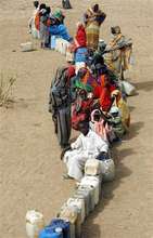 Refugees Wait for Water