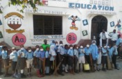 Providing books, desks & food to 300 slums kids.