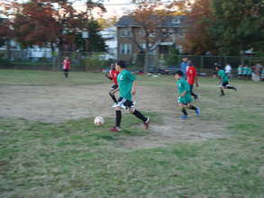 Middle school boys playing soccer