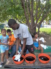 Nana helping campers tie-dye