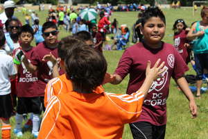 High Fives After Elementary School Game