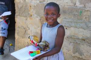 Andiswa with her Learnign at Home Pack & invention