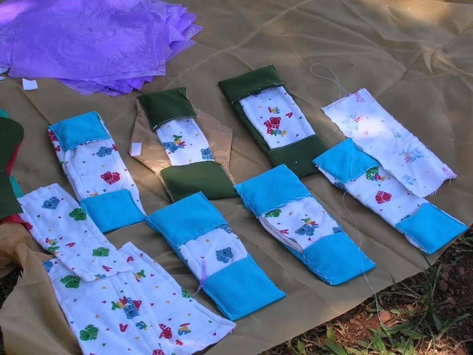 Train 700 girls to sew sanitary pads&face masks