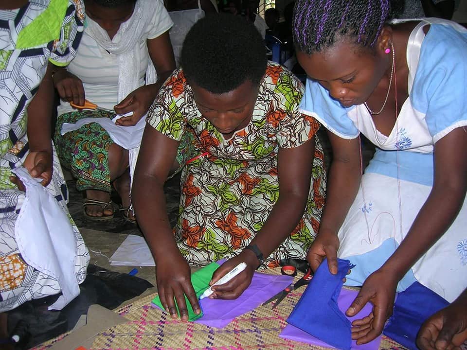 Train 700 girls to sew sanitary pads&face masks