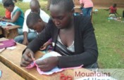 Train 700 girls to sew sanitary pads&face masks