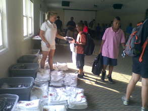 Handing out equipment and uniforms!