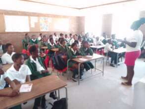 Addressing the girls about reusable sanitary pads