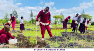 STUDENTS WATERING PLANTS