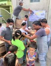 Children in line to receive supplies