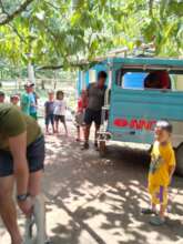 School children watch the builders