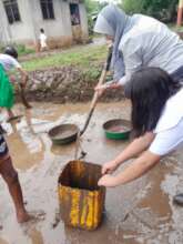 A tedious job to clear the mud left behind