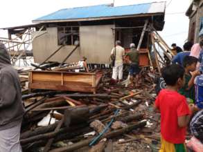 Families try to salvage belongings