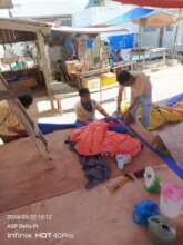 Building island school, repairing storm damge