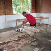 Local parents and volunteers build classrooms