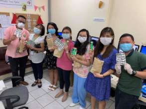 Health workers receiving medical supplies