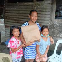 Family receives package of food relief
