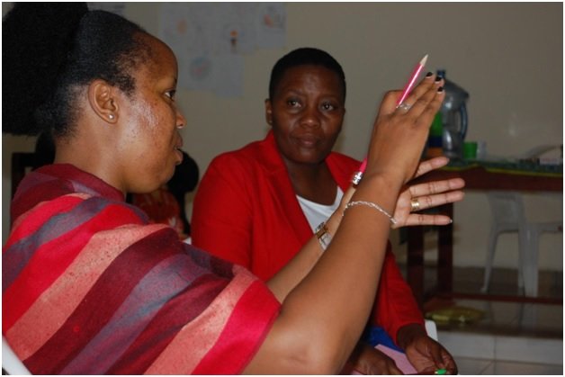 Two participants in small group discussion
