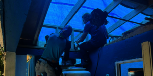 Esther depended on blue tarps as a temporary roof