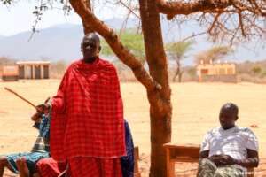 Community dialogue session in Eluanata