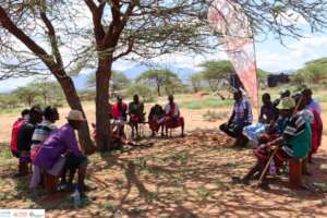 Community dialogue with elders in Wamba West