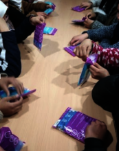 Project Soar Girls excitedly open their period kit