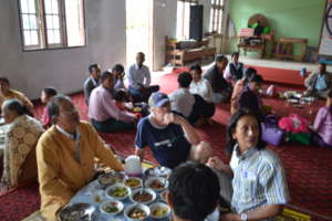 Enjoying a good meal with community members!