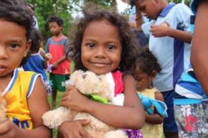 Girl with donated toy