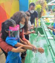 Girls are taught how to wash their hands