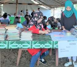 Homeless family event -books and school supplies