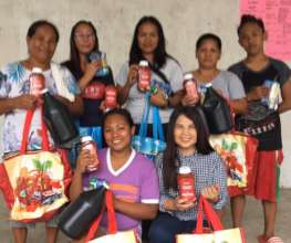 Moms receive AAI food donations