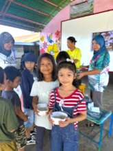 A meal is given for students at camp