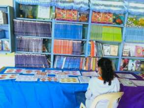Child in the AAI-sponsored library