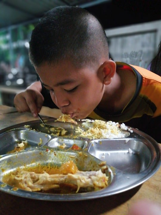 Feeding orphans of HIV+ Burmese women