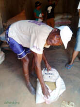 Jean with seeds for a new rice variety 2018
