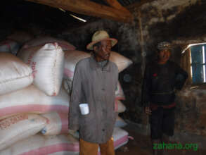 Jean in the village's rice bank 2019