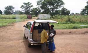 Delivering medicines for Omilling village clinic