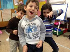 Students in a creative movement and music workshop