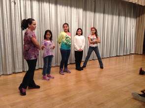 Students in an after school drama workshop.