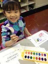 Happy participant in a visual arts workshop