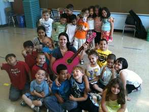 Teaching Artist, Robin Colwell, with students.