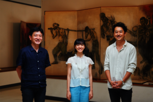 Yukina with the curator (L) and the director (R)