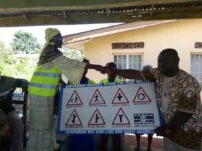 Handing over of road safety sign board